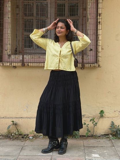 Model wearing Ikami Copenhagen top in an effortless everyday outfit