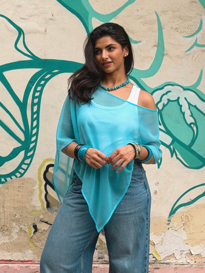 Front view of blue sheer Porto poncho by ikami