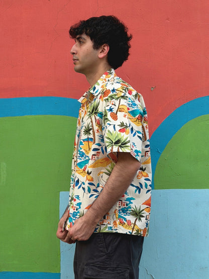 side view of model wearing the colourful ikami mykonos shirt 