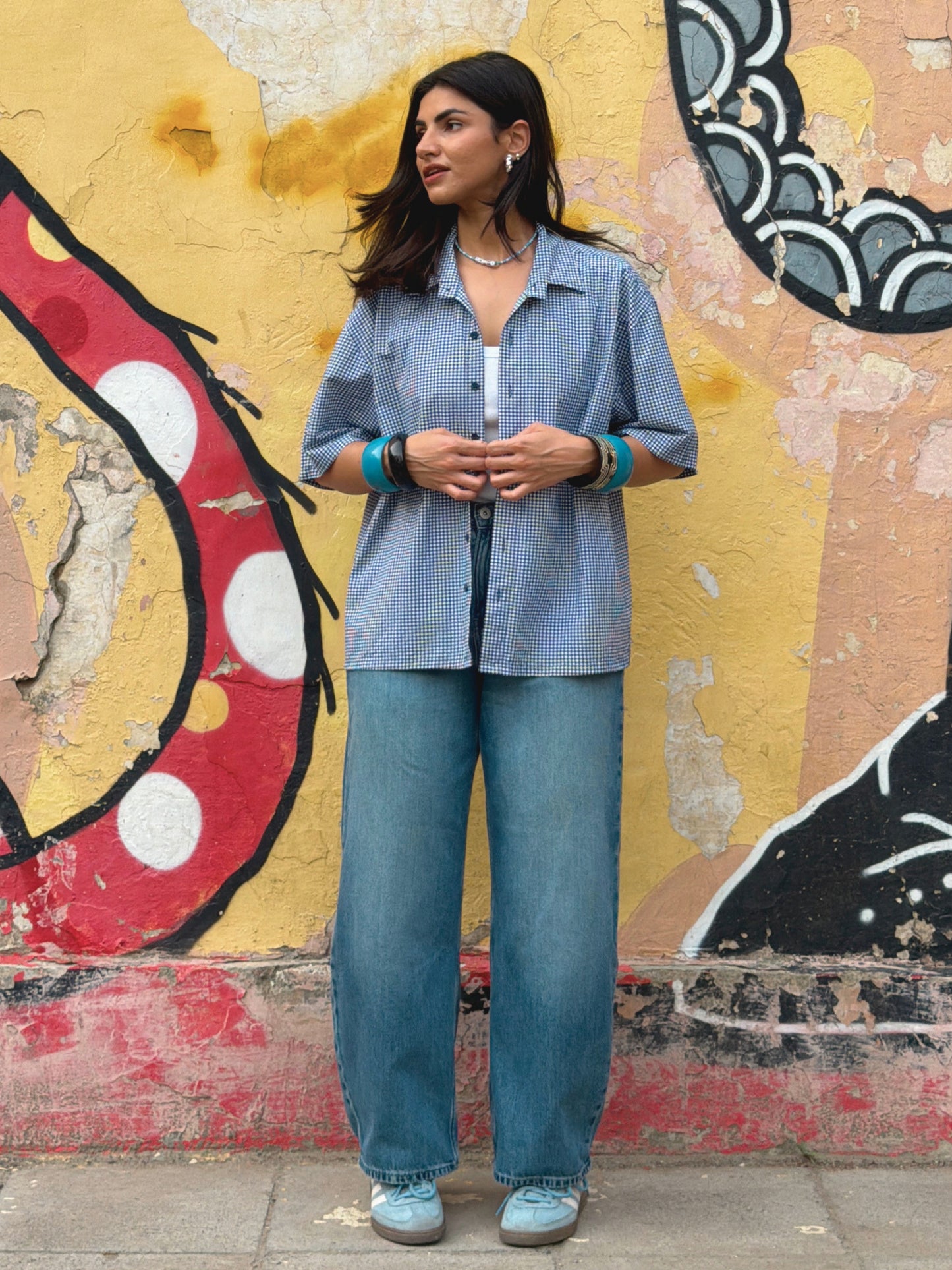 model wearing the classic ikami london shirt with a white thank top underneath