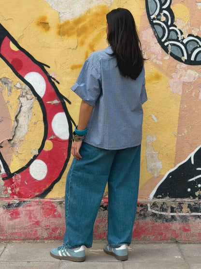 back side of the ikami classic london shirt on a woman