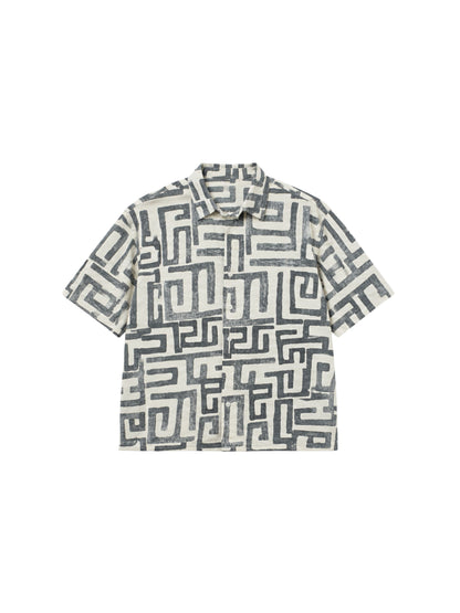 Short-sleeve ikami madrid shirt with geometric pattern on a white background