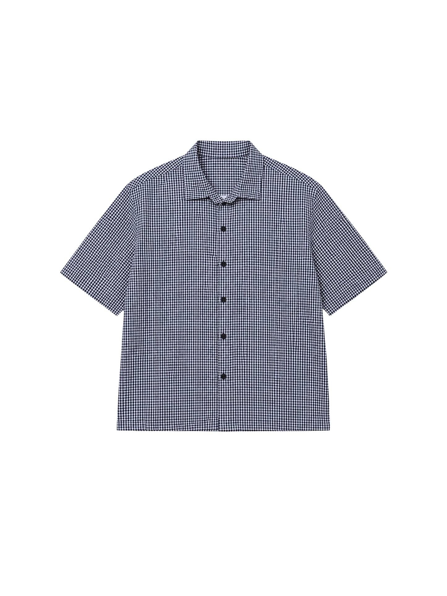 flatlay of ikami london shirt on a white background