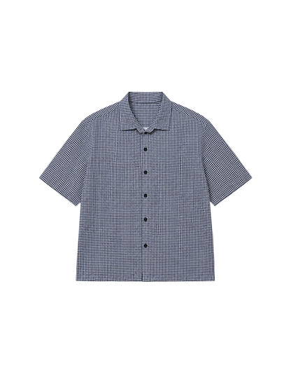 flatlay of ikami london shirt on a white background