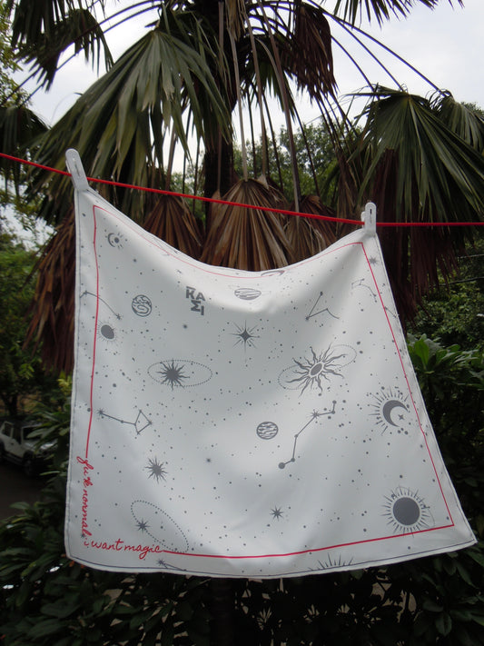 ikami orbit map bandana hanging on a string, flowing in air outdoors
